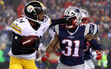 Justin Gilbert defends the ball against the New England Patriots' Jonathan Jones in the first half of the AFC Championship game last Jan. 22.