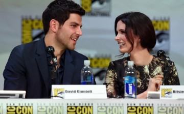 David Giuntoli (L) and Bitsie Tulloch attend the 'Grimm' season four panel during Comic-Con International 2014 at the San Diego Convention Center on July 26, 2014.