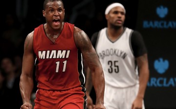 Dion Waiters of the Miami Heat celebrates his shot as Trevor Booker of the Brooklyn Nets defends in the fourth quarter at the Barclays Center on January 25, 2017 in the Brooklyn borough of New York City.