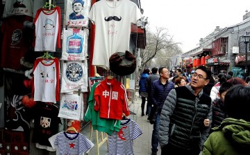 Various T-shirts on sale along the popular Nanluoguxiang street in Beijing on the first day of the Lunar New Year.