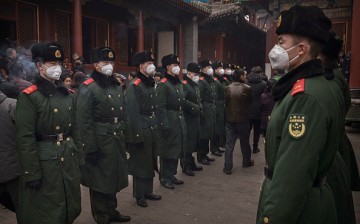 Chinese paramilitary police undertake crowd control duties on the first day of the Chinese Lunar New Year.