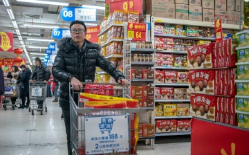 Walmart stores are decorated with Chinese lanterns and discount posters to attract customers.