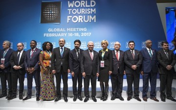 Participants pose for a  photo during the 2017 World Tourism Forum.