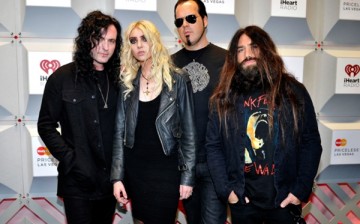 Ben Phillips, Taylor Momsen, Mark Damon and Jamie Perkins of the band The Pretty Reckless attend the 2014 iHeartRadio Music Festival at the MGM Grand Garden Arena on September 19, 2014 in Las Vegas, Nevada. 