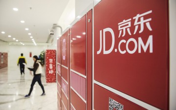 Employees at work in JD.com's headquarters in Beijing. 