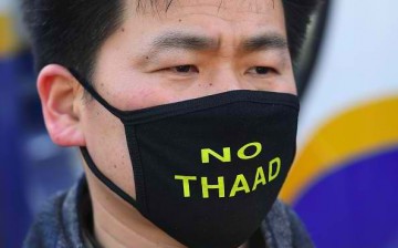 Protesters from South Korea oppose the THAAD.