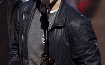 Eminem accepts an award onstage during The 53rd Annual GRAMMY Awards held at Staples Center on February 13, 2011 in Los Angeles, California. 