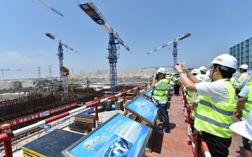 Public representatives and reporters visit a construction site of Hualong One pilot nuclear project in Fuqing, southeast China's Fujian Province.