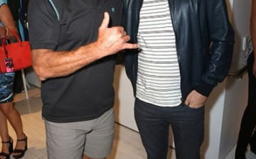 Professional surfer Laird Hamilton and 'Gangland Undercover' actor Sacha Baron Cohen attend the launch of Laird Apparel by Laird Hamilton at Ron Robinson on October 22, 2015 in Santa Monica, California. 