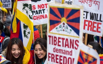 Supporters worldwide march to commemorate the Tibetan rebellion.