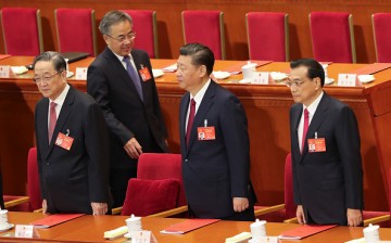 Chinese President Xi Jinping, Premier Li Keqiang and Yu Zhengsheng attend the closing meeting of the Fifth Session of the 12th National People's Congress.