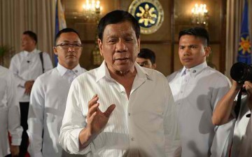 Philippine President Duterte talks to reporters on the issue of the Scarborough Shoal.