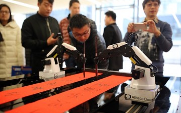 An artificial intelligence robot writes Chinese calligraphy on Jan. 16, 2017 in Hangzhou, Zhejiang Province of China. Hangzhou is one of three recipients of $10 million AI centers from the agreement.