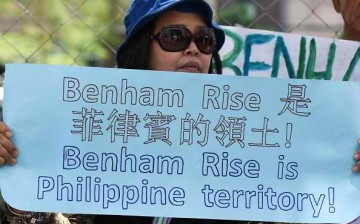 Rallyists in Manila protest over the presence of Chinese research vessels in the Benham Rise.