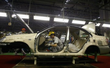 Workers Manufacture Cars at Dongfeng Nissan