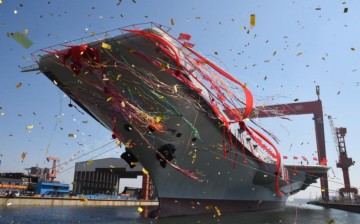 China launches first domestically made aircraft carrier.