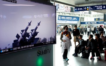 A television report about North Korea's missile launch is broadcast at the Seoul Railway Station on April 1, 2016 in Seoul, South Korea.