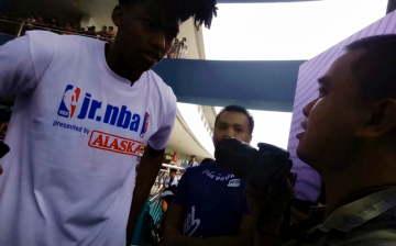 Conan Altatis interviews Orlando Magic's Elfrid Payton at the Music Hall of SMA Mall of Asia in Pasay City, Philippines, at the culminating activity of Jr. NBA Philippines' National Training Camp on May 14, 2017.