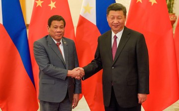 Chinese President Xi Jinping (R) shakes hands with Philippines President Rodrigo Duterte (L) prior to their bilateral meeting during the Belt and Road Forum for International Cooperation.