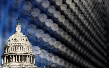 Light catches the security fence around the U.S. Capitol, erected in the wake of the January 6th attack but now scheduled to start being removed,