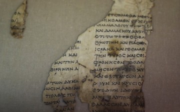 A recently-discovered scroll fragment of an ancient biblical text is seen at Israel Antiquities Authority laboratories in Jerusalem