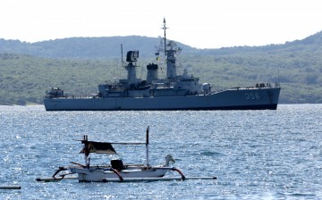 Indonesian Navy's KRI Karel Satsuitubun-356 is seen while preparing to dock at Tanjung Wangi port, as it is being prepared for rescue operation of the KRI Nanggala-402 that lost contact yesterday,