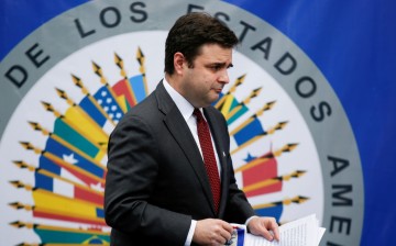 U.S. President Joe Biden's special envoy for the Northern Triangle Ricardo Zuniga walks during a news conference, in San Salvador, El Salvador