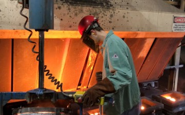 A worker pours hot metal at the Kirsh Foundry in Beaver Dam, Wisconsin, U.S.