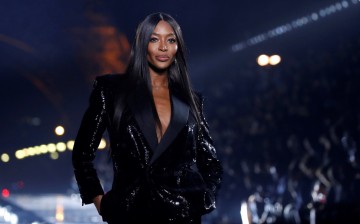 Naomi Campbell presents a creation by designer Anthony Vaccarello as part of his Spring/Summer 2020 women's ready-to-wear collection show