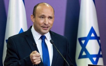 Far-right politician Naftali Bennett delivers a statement in the Knesset, the Israeli Parliament, in Jerusalem