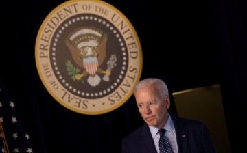 U.S. President Joe Biden departs after delivering an update on his administration's coronavirus disease (COVID-19) response in the Eisenhower Executive Office Building's South Court Auditorium 