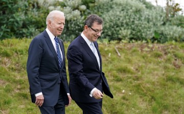 U.S. President Joe Biden arrives with Pfizer CEO, Albert Bourla, to make remarks about the coronavirus disease (COVID-19) vaccine during a visit to St. Ives in Cornwall, Britain, 