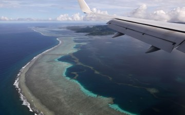 Plane carrying then U.S. Secretary of State Mike Pompeo makes its landing approach on Pohnpei International Airport in Kolonia,