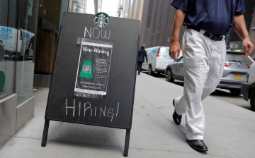 A sign advertising job openings is seen outside of a Starbucks in Manhattan, New York City, New York, U.S.,