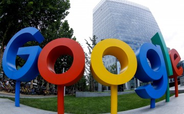 The brand logo of Alphabet Inc's Google is seen outside its office in Beijing, China August 8, 2018. Picture taken