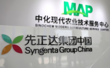 Syngenta Group China sign hangs at its Modern Agriculture Platform' (MAP) service centre, during a media tour in Wei county of Handan,