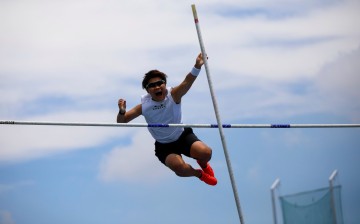 So Sato, 25, a deaf and transgender pole vaulter, works out during a camp training with other deaf athletes in Utsunomiya, north of Tokyo, Japan