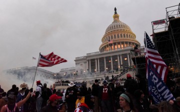 Police attempt to clear the U.S. Capitol Building with tear gas as supporters of U.S. President Donald Trump gather outside, in Washington, U.S.