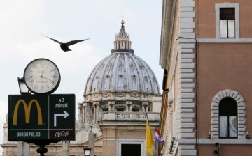 A McDonald's sign is seen at Via della Conciliazione street in Rome, Italy in front of Vatican City's St. Peter's Square 