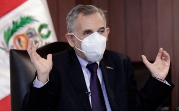 Peru's Finance Minister Pedro Francke gestures during an interview with Reuters in Lima, Peru