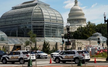 U.S. Capitol Police vehicles and other emergency vehicles respond as police investigated reports of a suspicious vehicle near the U.S. Capitol in Washington, U.S.,