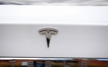The logo of Tesla cars logo is seen during the presentation of the new charge system in the EUREF campus in Berlin, Germany