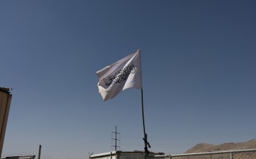 The flag of the Islamic Emirate of Afghanistan (Taliban) is raised at the military airfield in Kabul, Afghanistan,