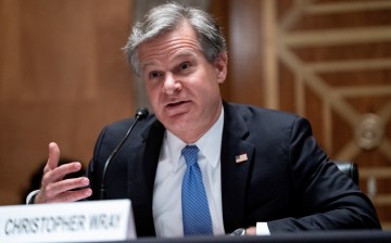 FBI Director Christopher Wray testifies during a Senate Homeland Security and Governmental Affairs hearing to discuss security threats 20 years after the 9/11 attacks, in Washington, D.C., U.S