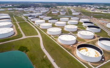 Crude oil storage tanks are seen in an aerial photograph at the Cushing oil hub in Cushing, Oklahoma, U.S.