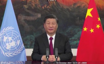 Chinese President Xi Jinping delivers a speech addressing the COP15 biodiversity summit in Kunming, China