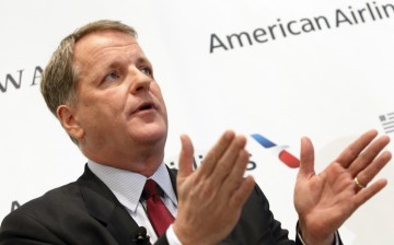 U.S. Airways CEO Doug Parker announces the planned merger of AMR Corp, the parent of American Airlines, with U.S. Airways during a news conference at Dallas-Ft Worth International Airport
