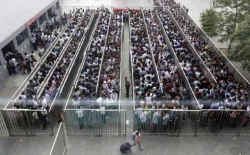 Beijing subway lines can be long during the rush hour.