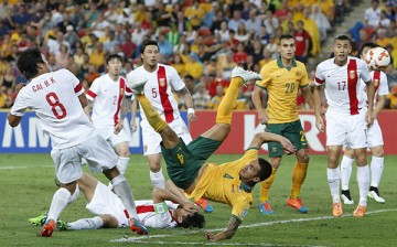 Tim Cahill (No. 4) scores a goal against China in the AFC Cup Group Stages. 