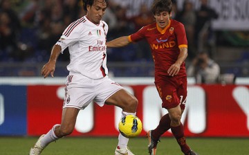 Alessandro Nesta (L) playing for AC Milan in their match against AS Roma.
